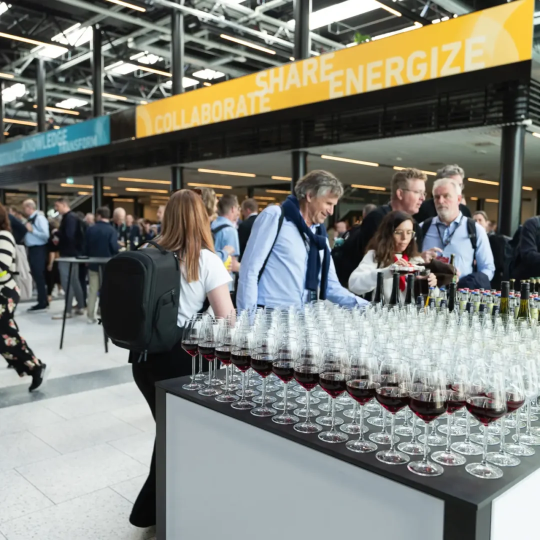 Attendees networking during an international business conference in Copenhagen