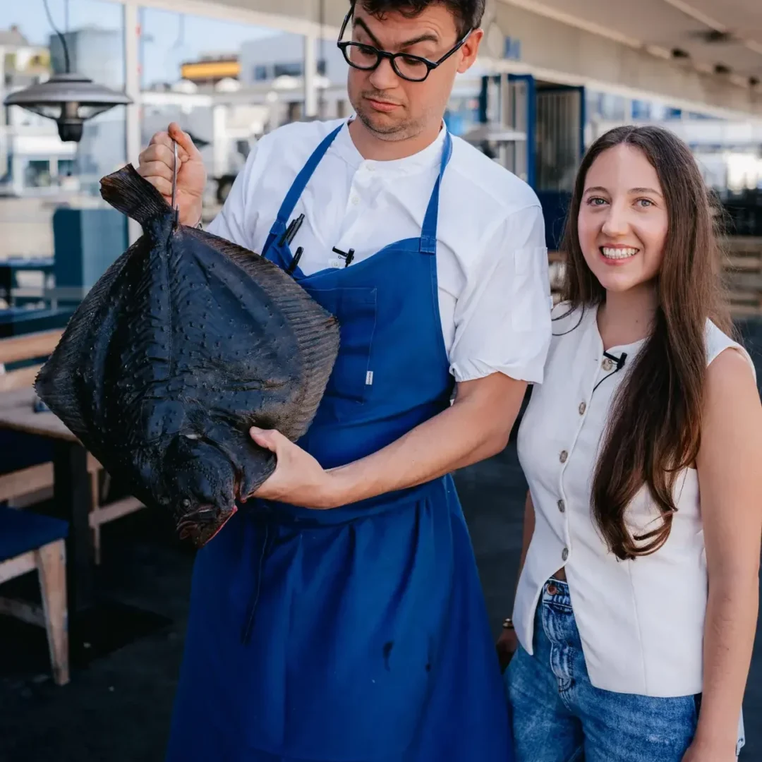 Chef Jamie Lee holding fresh mackerel at Kødbyens Fiskebaren — cinematic chef series filmed in Copenhagen by 5 ALIVE MEDIA